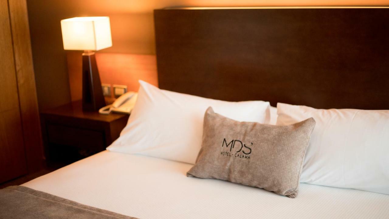 Mds Hotel Calama Zewnętrze zdjęcie A bed at the MÖS Hotel in Cologne, Germany